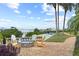 A communal seating area with a fire pit and kayaks near the marina at 2700 N Peninsula Ave # 215, New Smyrna Beach, FL 32169