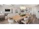 Spacious open-concept floorplan featuring dining area, kitchen, and living room for modern living at 2749 Serenity Meadow Dr, Kissimmee, FL 34744