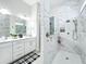 Beautiful bathroom featuring double vanity, tile flooring, and glass shower at 3182 Sailing Pier Ave, Winter Garden, FL 34787