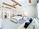 Spacious main bedroom showcases hardwood flooring, ceiling fan, and comfortable furniture at 3182 Sailing Pier Ave, Winter Garden, FL 34787