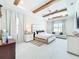 The main bedroom features tray ceilings, a ceiling fan, neutral decor, and lots of natural light at 3182 Sailing Pier Ave, Winter Garden, FL 34787