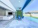 Awesome outdoor patio, seamlessly connected to the living room via sliding doors, and boasting a refreshing swimming pool view at 3182 Sailing Pier Ave, Winter Garden, FL 34787