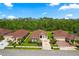 Aerial view of home showcasing a well-manicured lawn and wooded area at 3375 Bellino Blvd., New Smyrna Beach, FL 32168