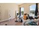 Bedroom with carpet, two windows, and a standing mirror at 3375 Bellino Blvd., New Smyrna Beach, FL 32168