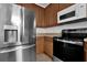 Kitchen features stainless steel refrigerator and oven at 3462 Allegra Cir, St Cloud, FL 34772