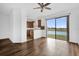 Spacious open floor plan with views of the kitchen and the backyard pond at 3462 Allegra Cir, St Cloud, FL 34772