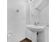 Clean and simple powder room with a pedestal sink and tile floor at 3462 Allegra Cir, St Cloud, FL 34772