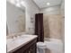 Bathroom featuring a vanity with countertop space, large mirror, and a tub/shower combo at 3664 Farm Bell Pl, Lake Mary, FL 32746