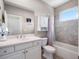 Well-lit bathroom featuring a vanity with countertop space, a large mirror, and a tub/shower combo at 3664 Farm Bell Pl, Lake Mary, FL 32746