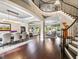 Spacious formal dining room with hardwood floors, elegant lighting, and views into the living spaces at 3664 Farm Bell Pl, Lake Mary, FL 32746