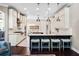 Bright kitchen with white cabinets, stainless steel appliances, and a kitchen island at 3664 Farm Bell Pl, Lake Mary, FL 32746