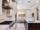 Gourmet kitchen featuring a center island and modern appliances, perfect for entertaining at 3664 Farm Bell Pl, Lake Mary, FL 32746