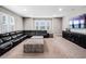 Spacious living room boasts ample seating, plush carpeting, and bright, natural light from the large window at 3664 Farm Bell Pl, Lake Mary, FL 32746