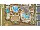 Aerial view showcasing the community's various pools, water park, clubhouse, and recreational areas at 368 Ocean Course Ave, Davenport, FL 33896