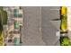 Aerial view of home featuring screened pools and well-maintained roof at 368 Ocean Course Ave, Davenport, FL 33896