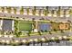 An overhead view of community amenities including a soccer field, basketball court, and playground at 368 Ocean Course Ave, Davenport, FL 33896