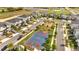 Aerial view of a colorful basketball court and playground in the community at 368 Ocean Course Ave, Davenport, FL 33896