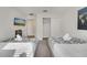 Comfortable bedroom with two twin beds, TV, and easy access to a closet at 368 Ocean Course Ave, Davenport, FL 33896