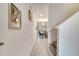 Hallway features tile flooring, recessed lighting and view into the dining area at 368 Ocean Course Ave, Davenport, FL 33896
