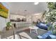 Bright and airy living area with seamless access to the kitchen and dining area, perfect for entertaining at 368 Ocean Course Ave, Davenport, FL 33896