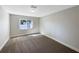 Bedroom featuring neutral paint colors, new carpet, new windows and baseboards at 370 E Waldo St, Groveland, FL 34736