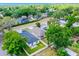 A high angle aerial view of a home with well-maintained green yard and neighborhood at 3723 Broadway St, Gotha, FL 34734