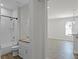 Bright bathroom features a white subway tile shower and granite vanity at 3723 Broadway St, Gotha, FL 34734