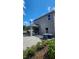 Spacious backyard patio with an outdoor seating area perfect for entertaining at 402 Cool Summer Ln, Davenport, FL 33837