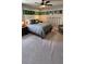 Golf themed bedroom with wall art, ceiling fan, and decor with neutral carpeting at 402 Cool Summer Ln, Davenport, FL 33837