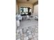 Outdoor patio featuring comfortable seating, a coffee table, and tiled flooring at 402 Cool Summer Ln, Davenport, FL 33837