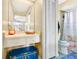 Charming bathroom features a vanity area, coordinated beach-themed décor, and a shower with a beach-themed curtain at 432 Taylorville St, Deltona, FL 32725