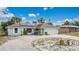 Inviting single-story home featuring well-maintained landscaping and solar panels at 432 Taylorville St, Deltona, FL 32725