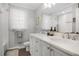 Bright bathroom with double sinks, marble countertops, and modern fixtures at 450 Andrews Dr, Longwood, FL 32750