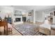 Welcoming living room with fireplace and view to the kitchen at 450 Andrews Dr, Longwood, FL 32750