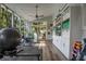 Bright workout room with natural light, ceiling fan, hardwood floors, and exercise equipment at 450 Andrews Dr, Longwood, FL 32750