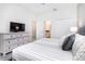 Spacious bedroom with dresser, TV, and a serene, relaxing atmosphere at 4501 Target Blvd, Kissimmee, FL 34746
