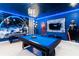 This awesome blue game room includes a pool table and Star Wars themed decor at 4501 Target Blvd, Kissimmee, FL 34746