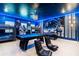This blue, Star Wars themed game room features a pool table, bunk beds, and lounge chairs at 4501 Target Blvd, Kissimmee, FL 34746
