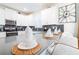 Stylish kitchen featuring a breakfast bar, quartz countertops, and white cabinets at 4501 Target Blvd, Kissimmee, FL 34746