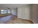 Spacious bedroom featuring new laminate flooring and a ceiling fan at 4510 Ravinnia Dr, Orlando, FL 32809