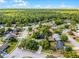 Aerial view of residential neighborhood with mature trees at 456 Willowbrook Ln, Longwood, FL 32779