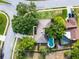 Aerial view of home, showcasing the pool, landscaping, and the surrounding neighborhood at 456 Willowbrook Ln, Longwood, FL 32779