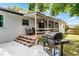 Outdoor entertaining area with a barbecue and a back porch at 456 Willowbrook Ln, Longwood, FL 32779