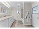 Bathroom with a double sink vanity and a shower-over-tub combination at 456 Willowbrook Ln, Longwood, FL 32779