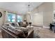 Spacious living room with vaulted ceilings and stylish decor at 456 Willowbrook Ln, Longwood, FL 32779