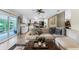 Open floor plan view from living room to kitchen featuring an island and lots of light at 456 Willowbrook Ln, Longwood, FL 32779