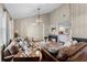 Comfortable living area with vaulted ceilings, neutral tones, and lots of decor at 456 Willowbrook Ln, Longwood, FL 32779