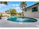 Backyard pool with concrete patio, steps, and home exterior at 456 Willowbrook Ln, Longwood, FL 32779