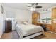 Bedroom featuring neutral walls, a ceiling fan, and natural lighting from the window at 5547 Kingswood Dr, Orlando, FL 32810