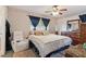 Comfortable main bedroom with plush carpeting, a cozy chair, and natural light at 5547 Kingswood Dr, Orlando, FL 32810